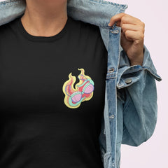 Black feminist shirt with a bra on fire illustration on the left breast of the shirt- shop feminist graphic tees