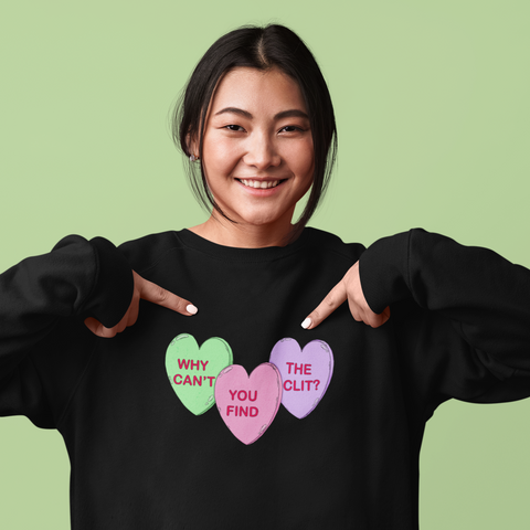 Why can’t you find the clit Unisex Feminist Sweatshirt featuring three candy hearts in the colours green, pink and purple- define feminism with our feminist apparel