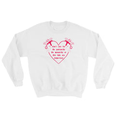 white feminist sweatshirt that says Don’t Care For The Patriarchy, The Monarchy Or This Fake Ass Democracy in red writing surrounded by angel cherubs holding guns- shop feminist sweatshirts and dump him shirts