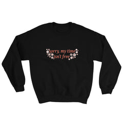 black feminist sweatshirt that says sorry my time isn't free in orange writing surrounded by white and orange retro flowers- shop feminist tees, political clothes and dump him shirts