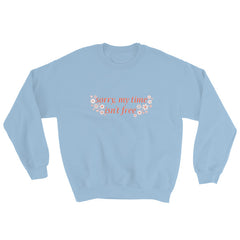 blue feminist sweatshirt that says sorry my time isn't free in orange writing surrounded by white and orange retro flowers- shop feminist apparel, political clothes and dump him shirts