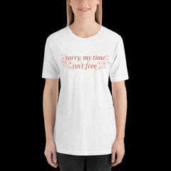 white feminist tshirt that says sorry my time isn't free in orange writing surrounded by white flowers- shop feminist apparel, dump him shirts and political clothing